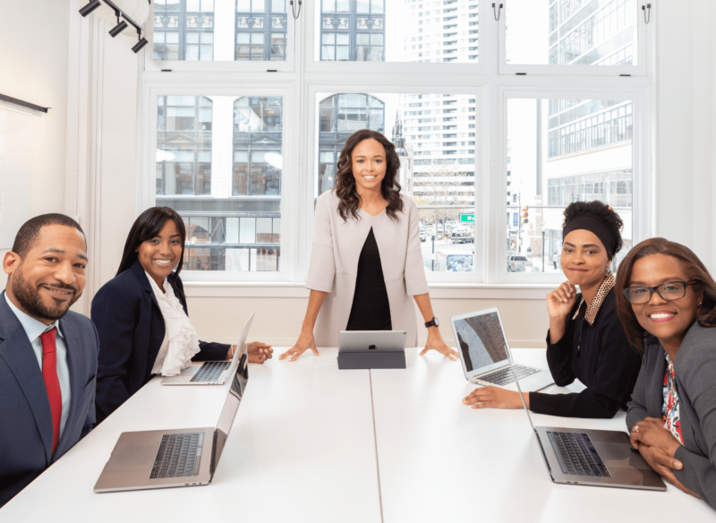 Masters degree in entrepreneurship female student standing behind a desk